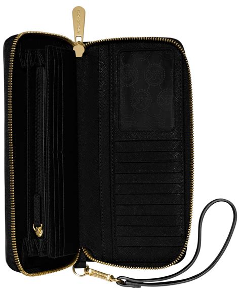 michael michael kors jet set continental wallet black|michael kors leather continental wristlet.